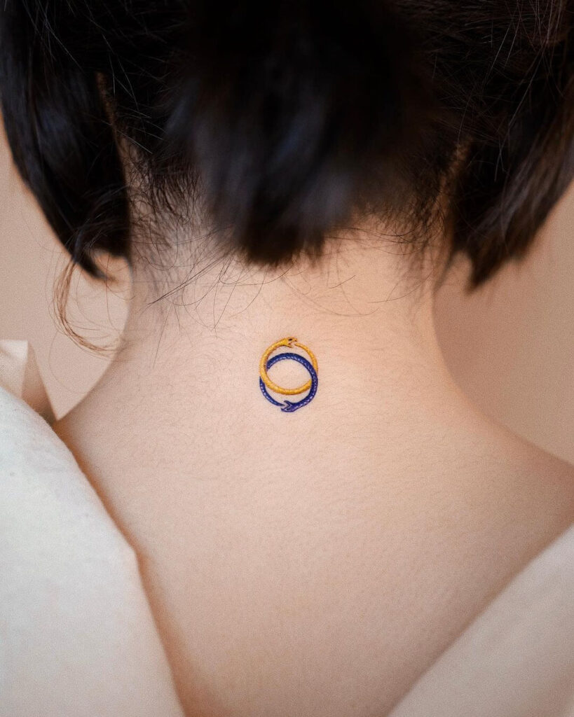 Mini neck tattoo