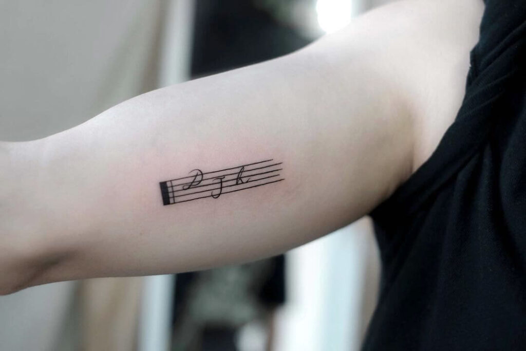 Music symbol family tattoo
