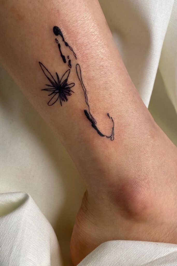 Extreme abstract ankle tattoo