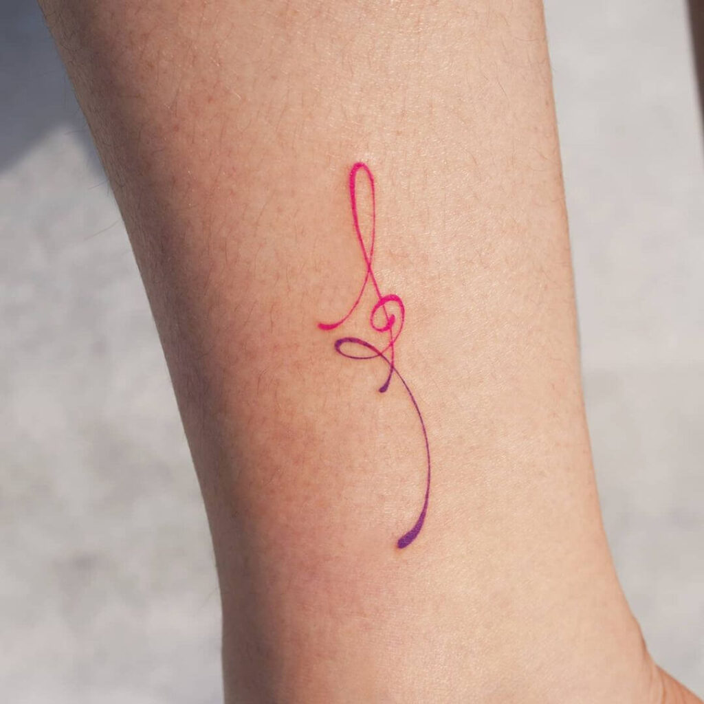 Music symbol ankle tattoo