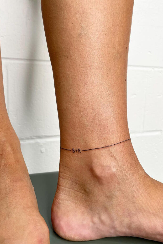 Thin line anklet tattoo