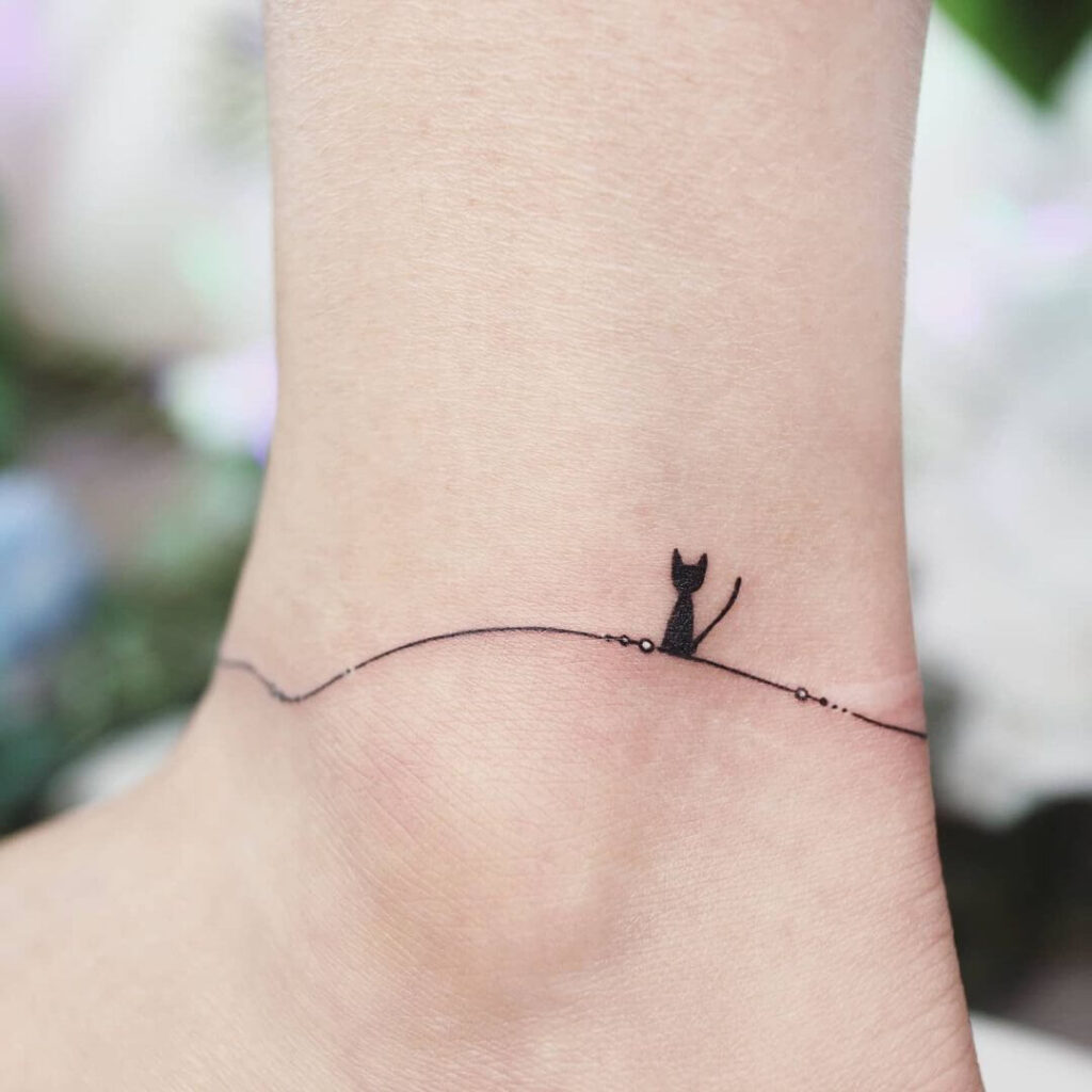 Cute cat anklet tattoo