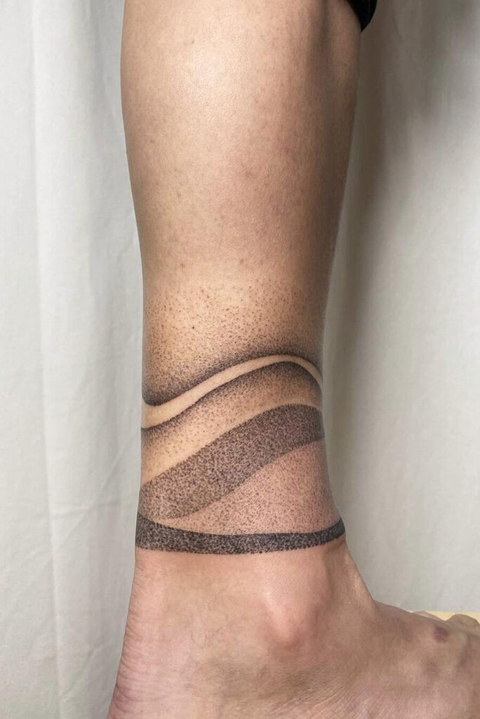 Abstract anklet tattoo