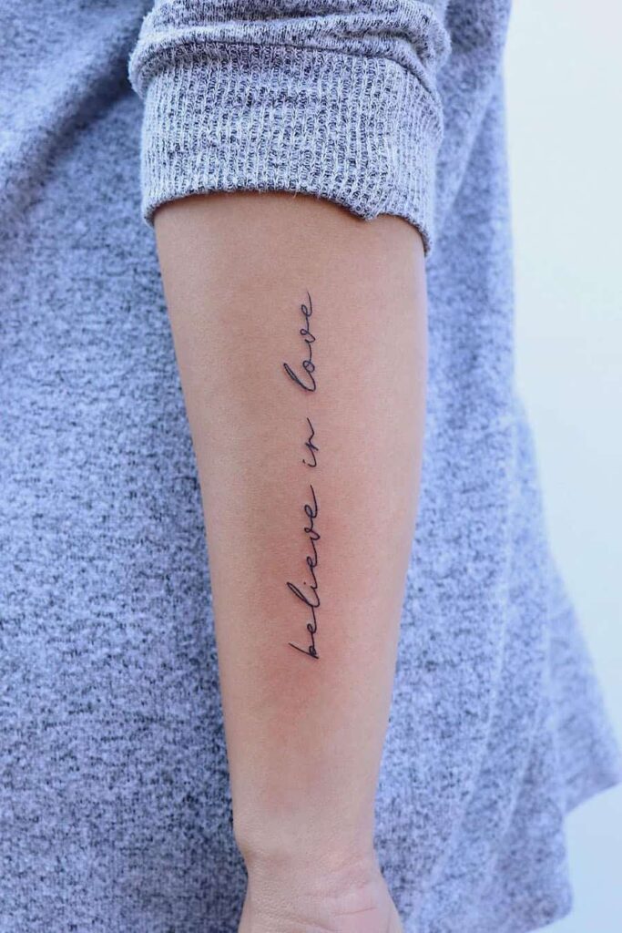 Vertical quote tattoo