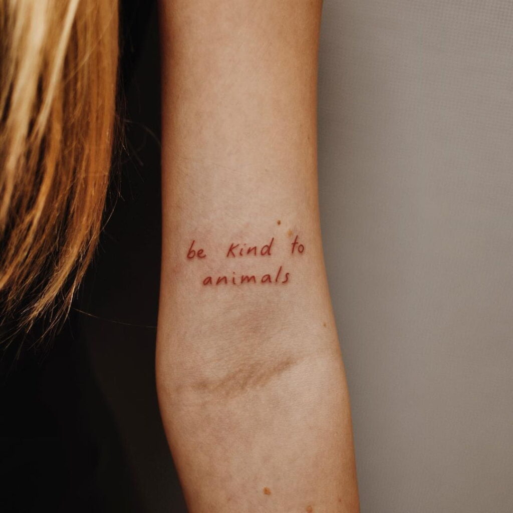 red quote tattoo