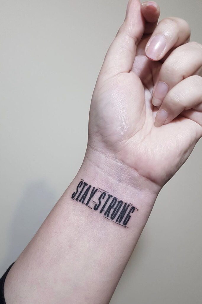 wrist quote tattoo