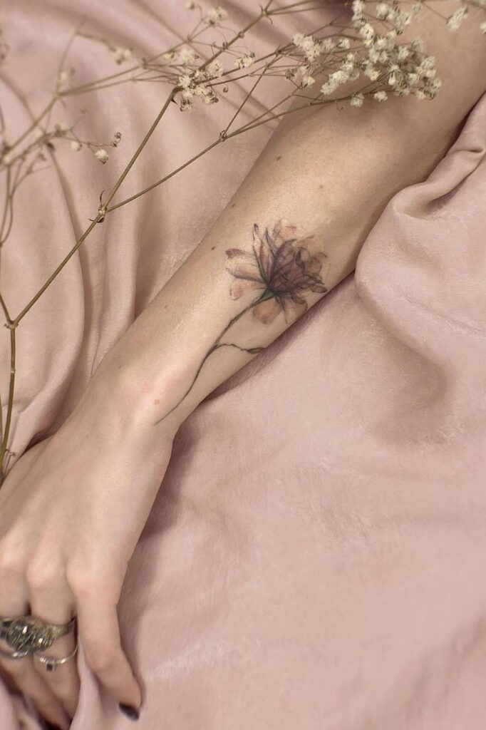 Rose wrist tattoo