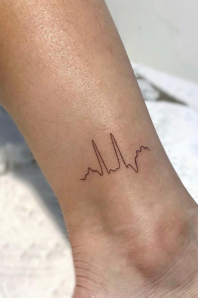 Heartbeat line tattoo