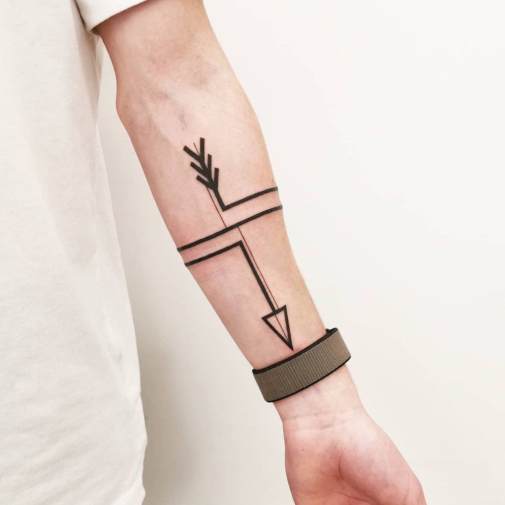 Modern minimalist arrow tattoo