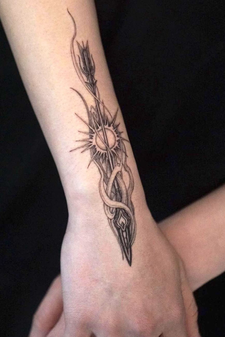 Push arrow tattoo