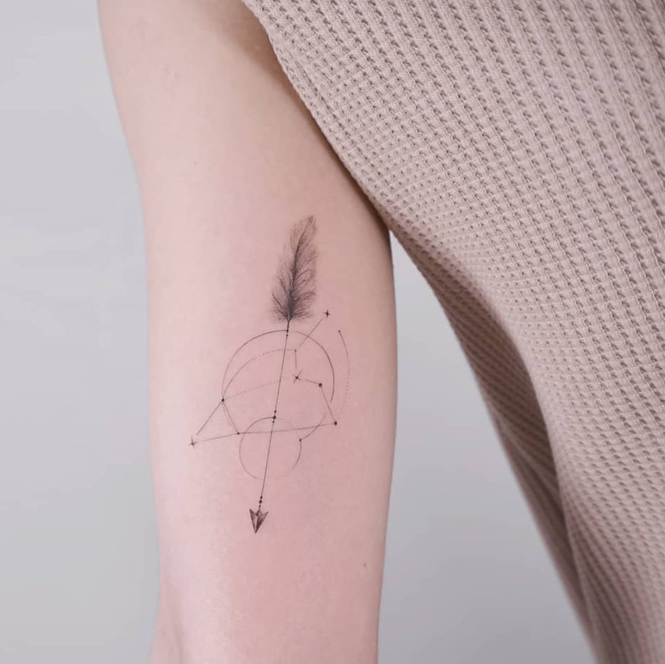 Zodiac arrow tattoo