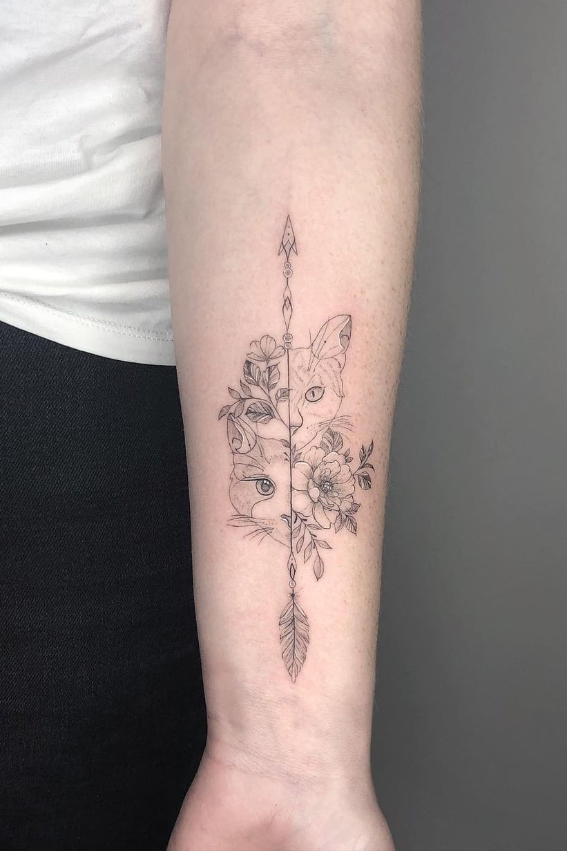 Cat arrow tattoo