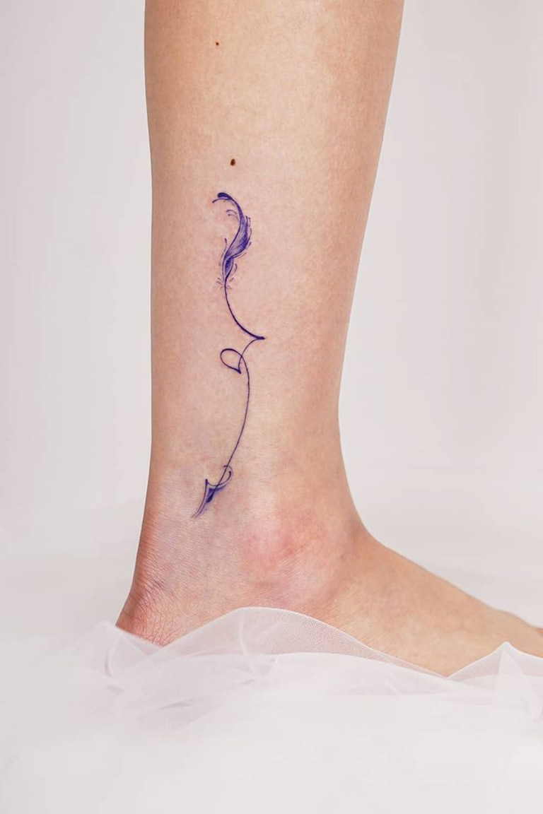 Purple arrow tattoo