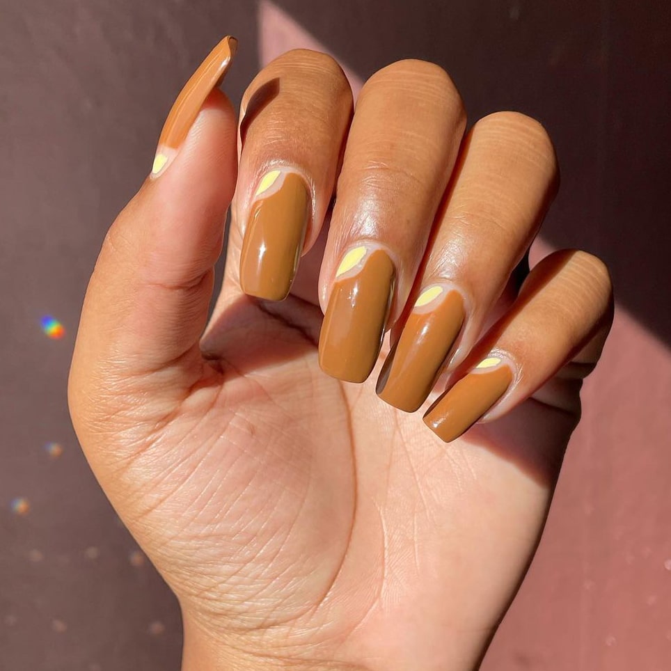 Warm brown negative space nails