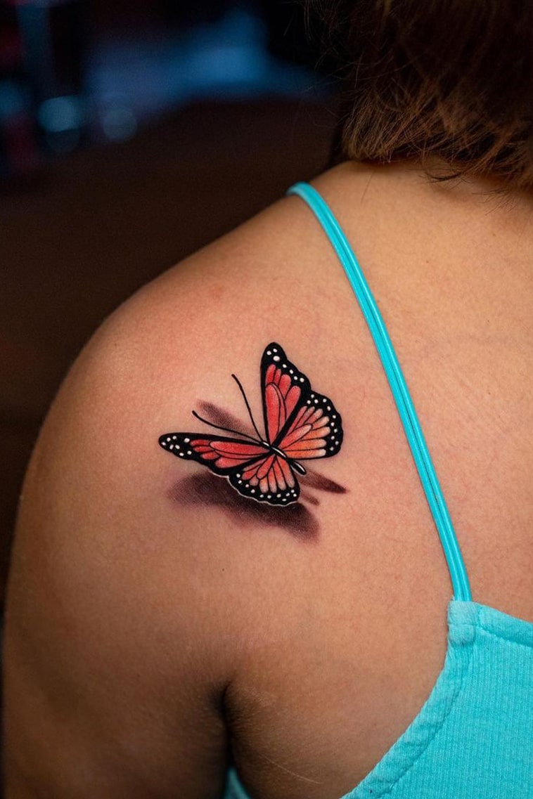 3D butterfly tattoo on shoulder