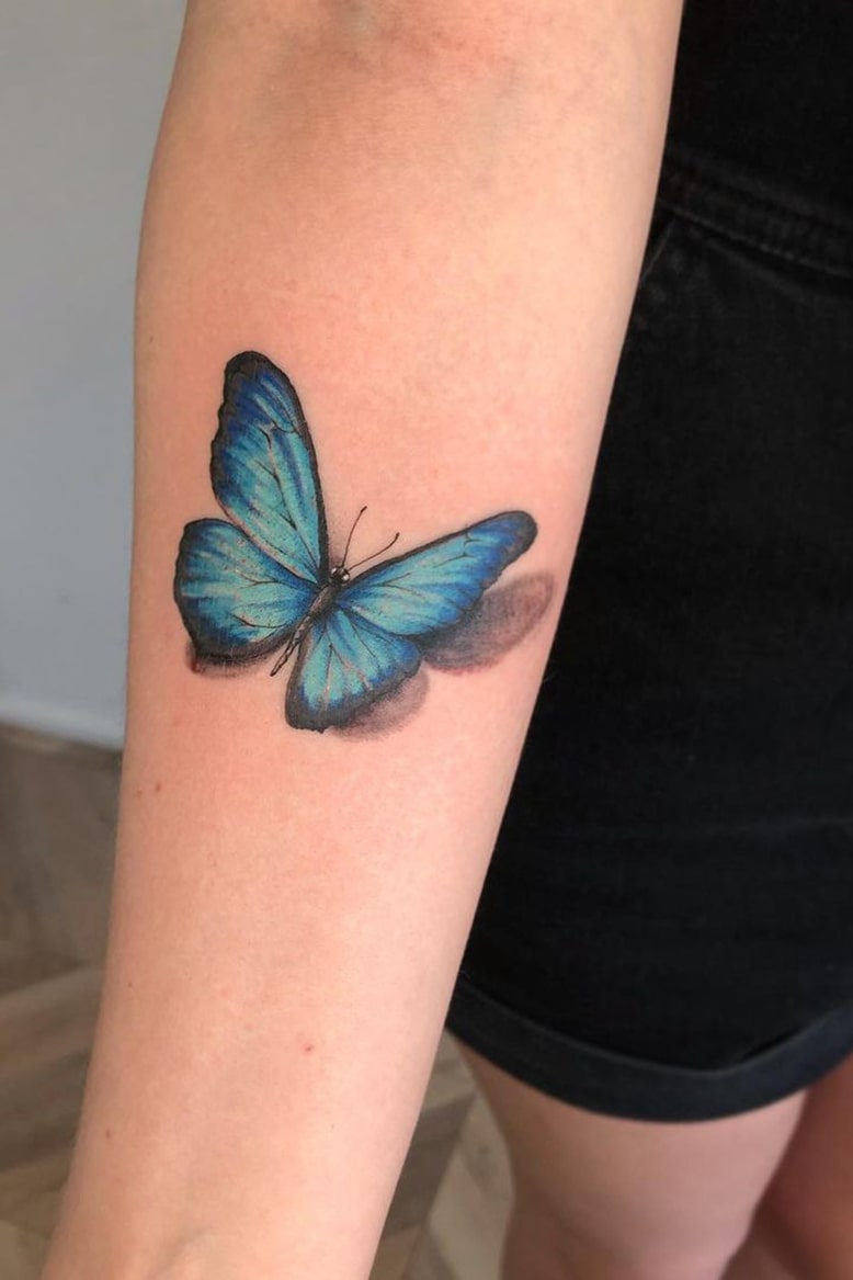 Blue 3d butterfly tattoo