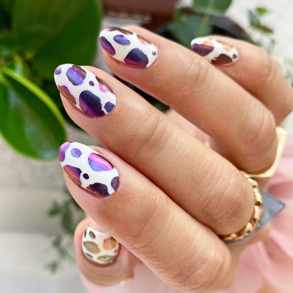 Cow print chrome nails