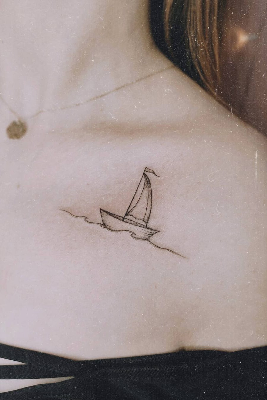 Boat collarbone tattoo