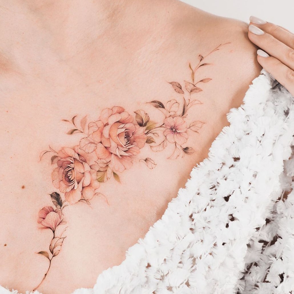 Flower collarbone tattoo