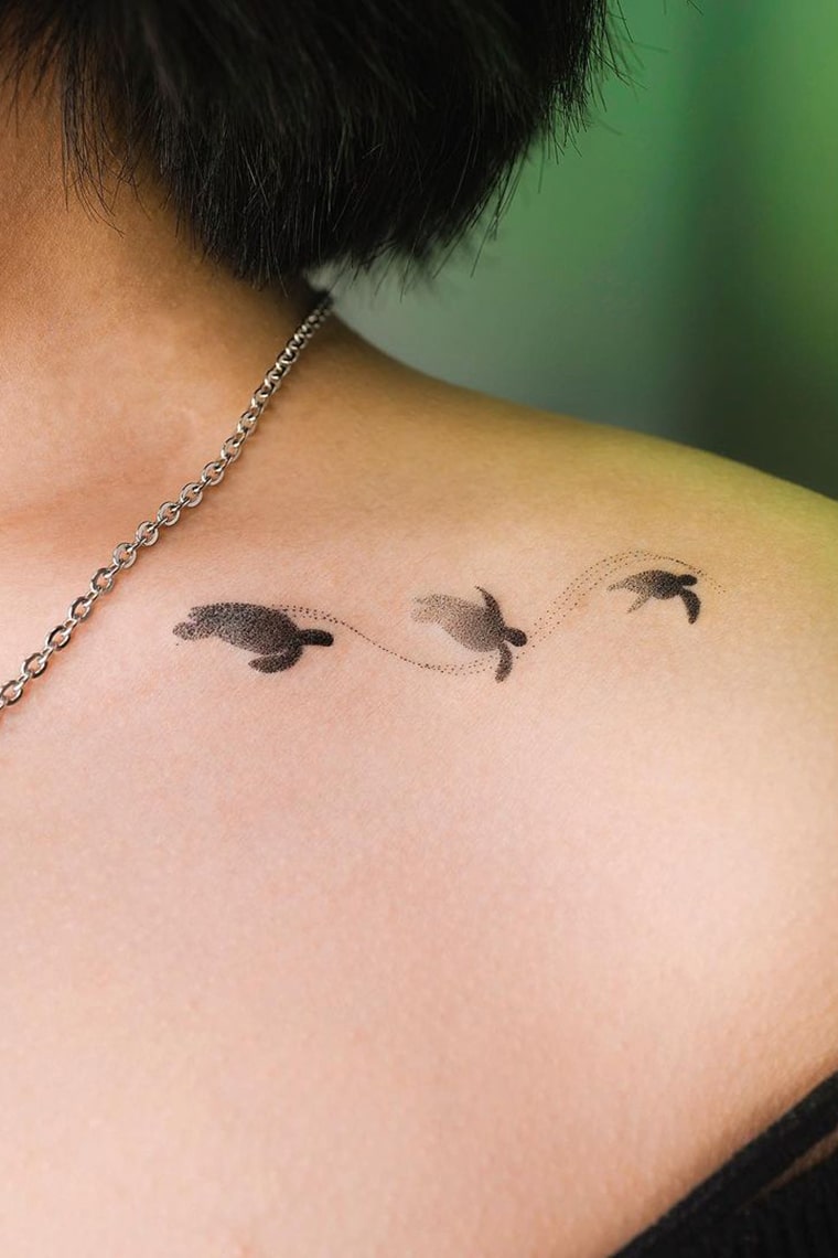 Turtle collarbone tattoo