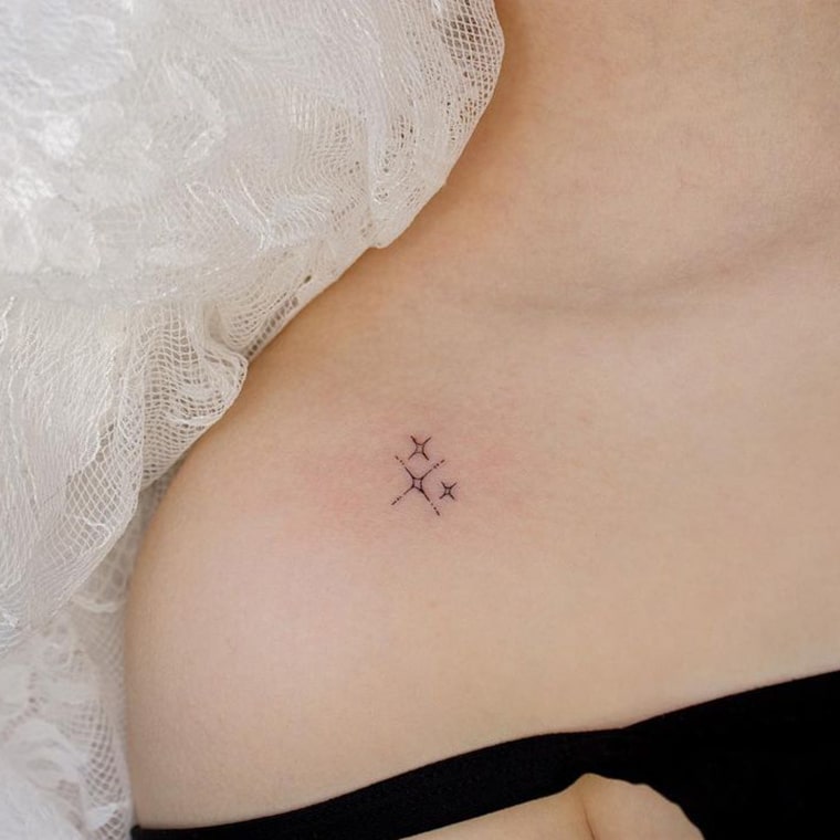 Small collarbone tattoo