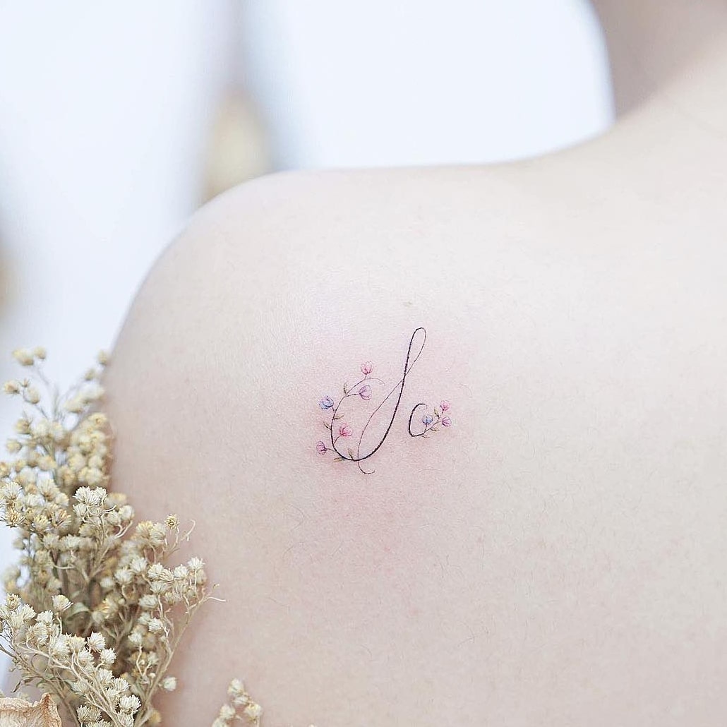 Letter Flower Small colorful Tattoo