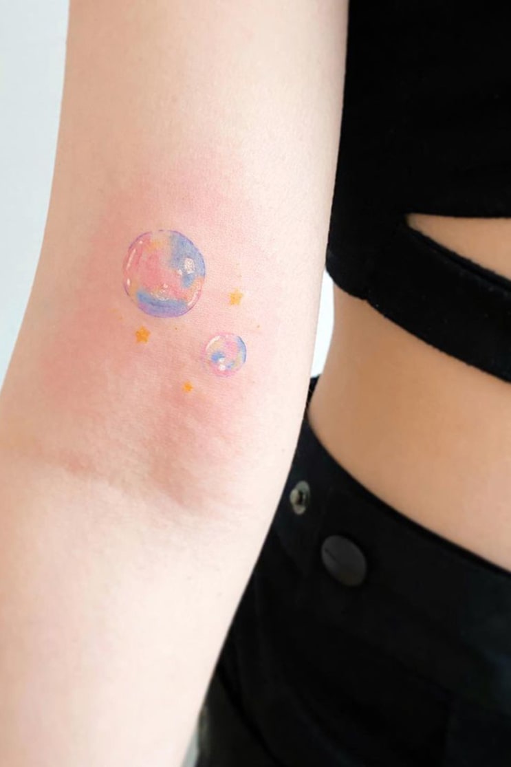 Bubble small colorful tattoo