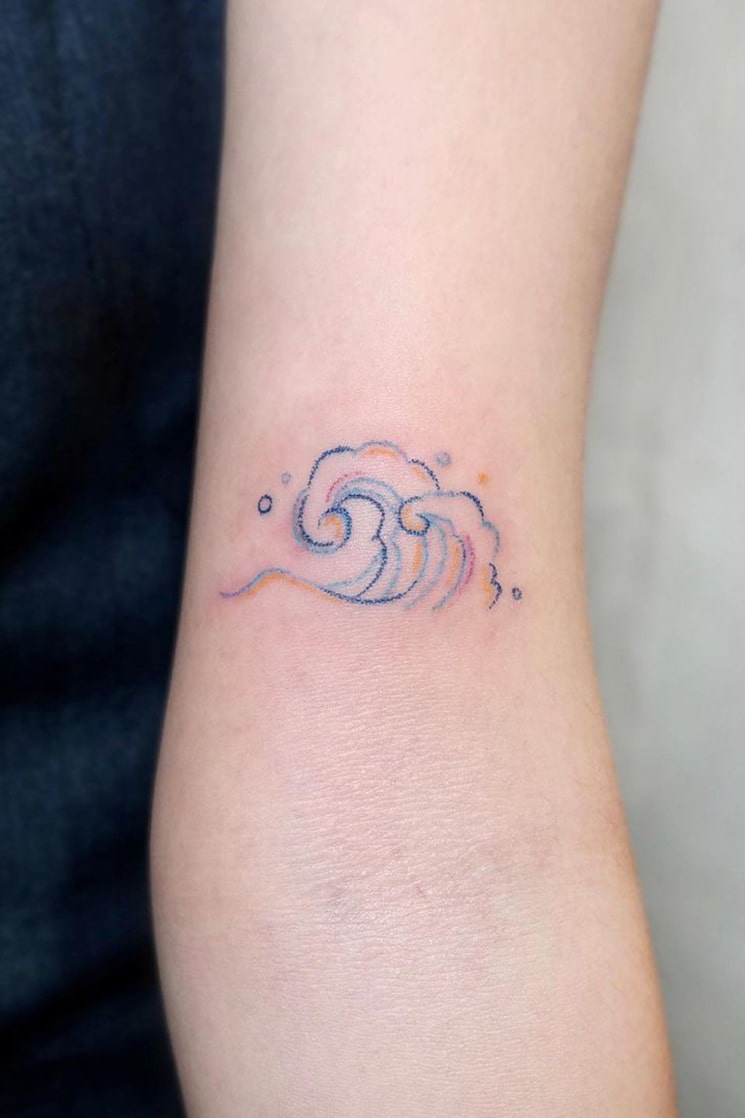 Wave small colorful tattoo