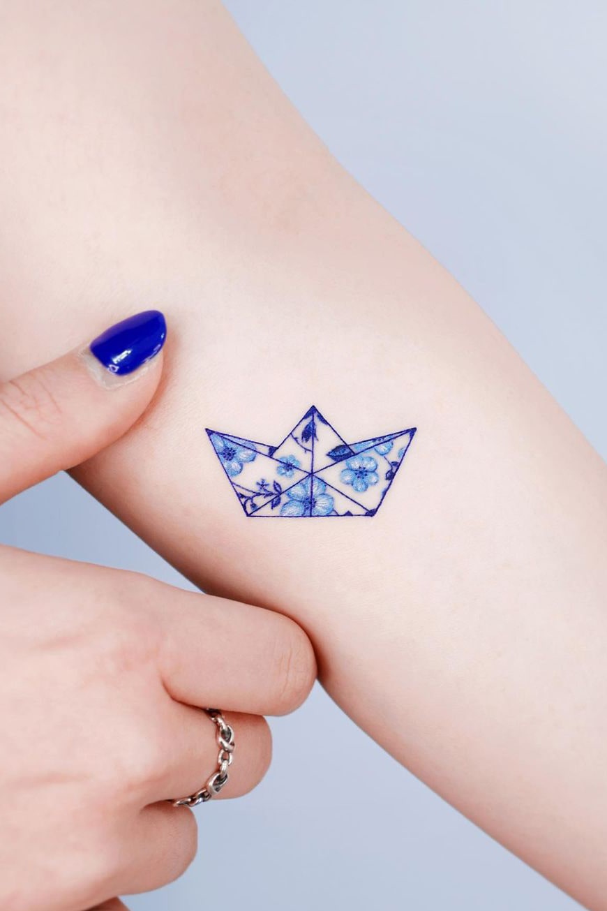 Exquisite paper boat small colorful tattoo