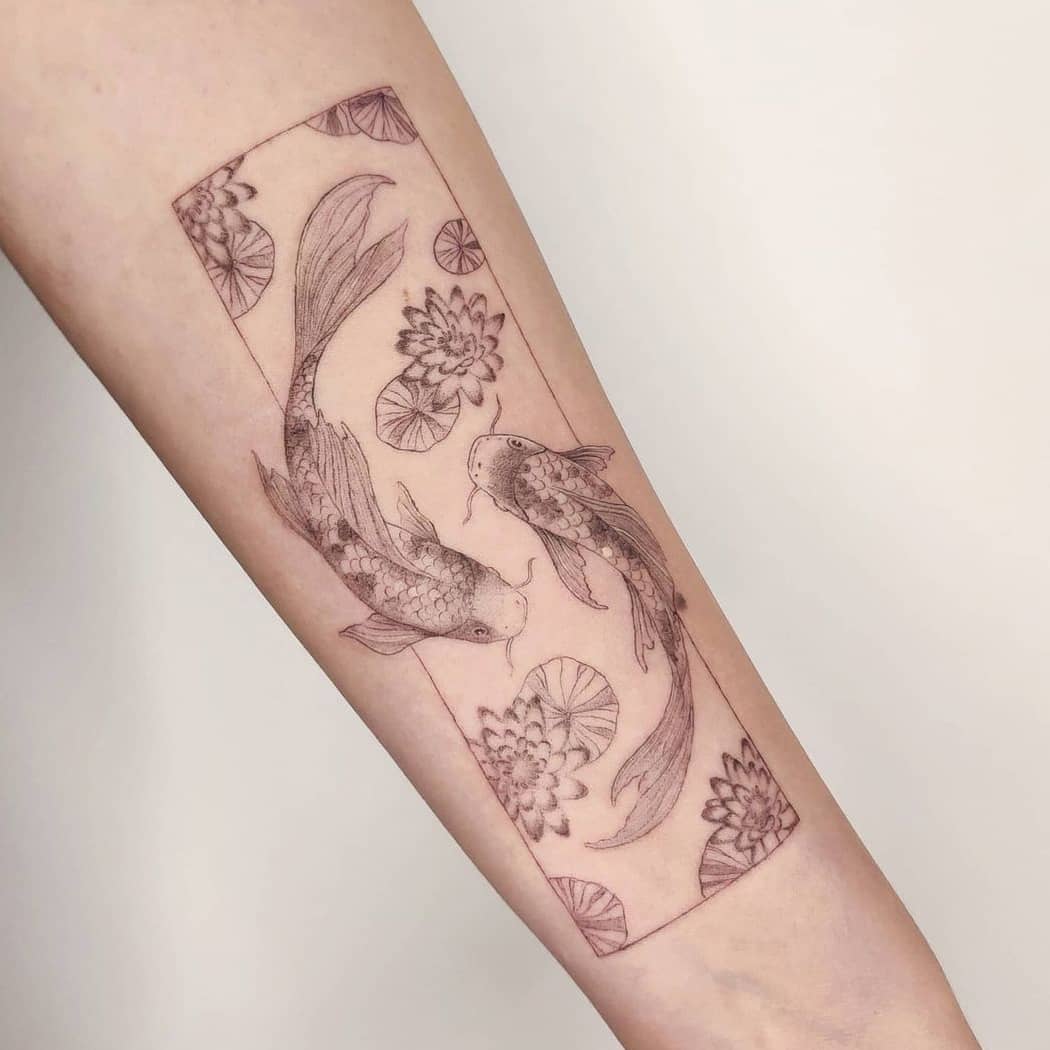 Koi fish lotus tattoo