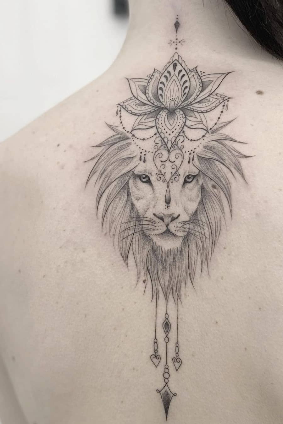 Lion lotus tattoo