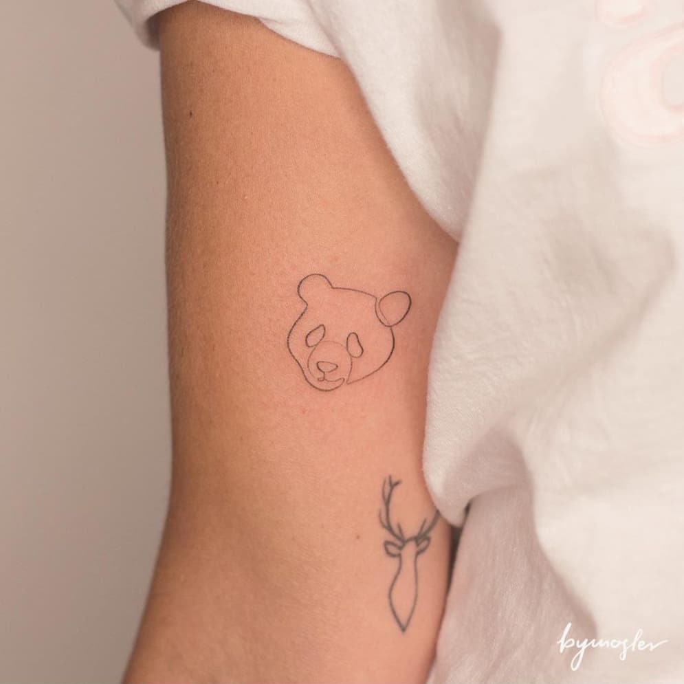 Minimalist panda tattoo