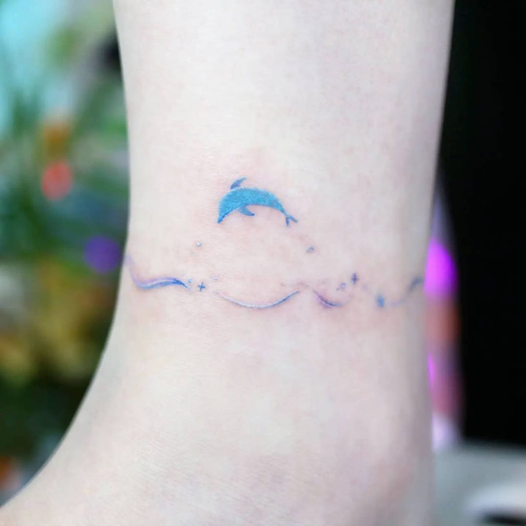 Dolphin Wave Tattoo