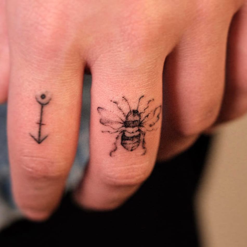 Bee tattoo on finger-2