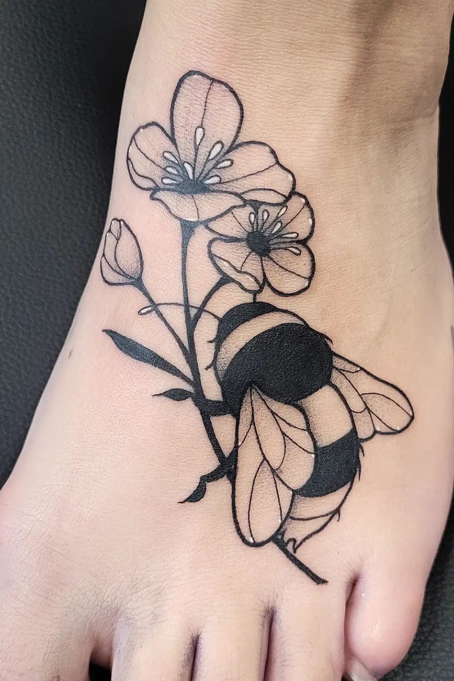 Bee tattoo on foot-1