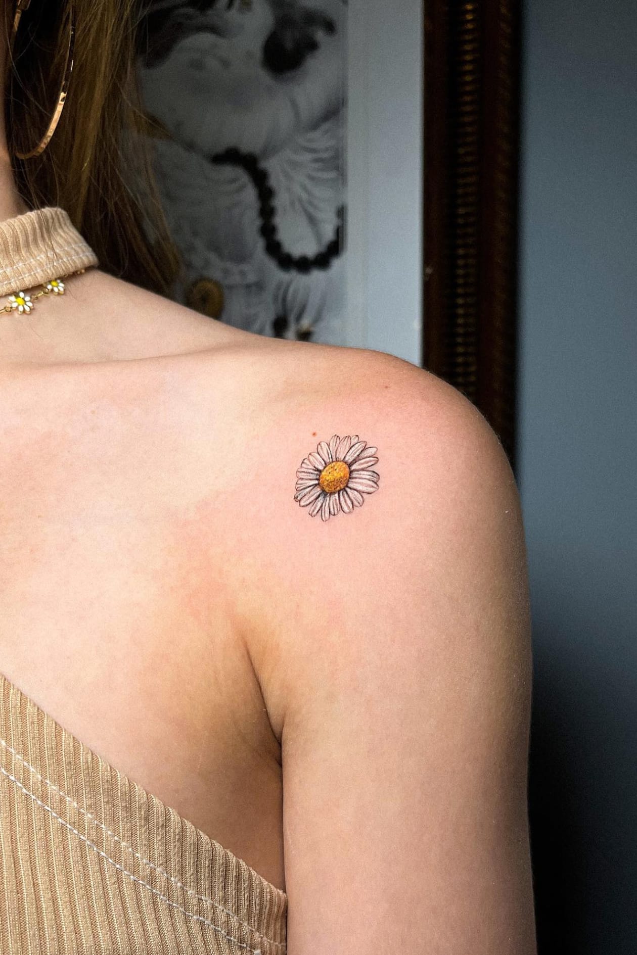 Daisy shoulder tattoo