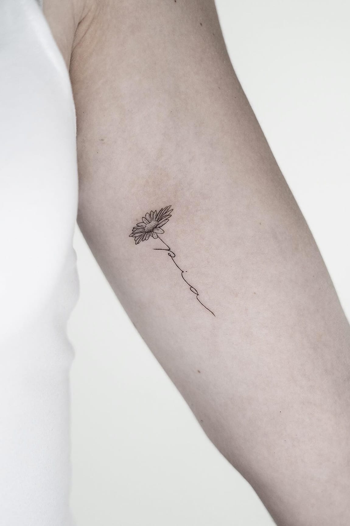 Daisy tattoo with name