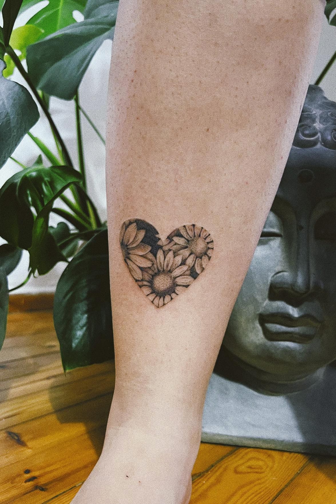 daisy heart tattoo