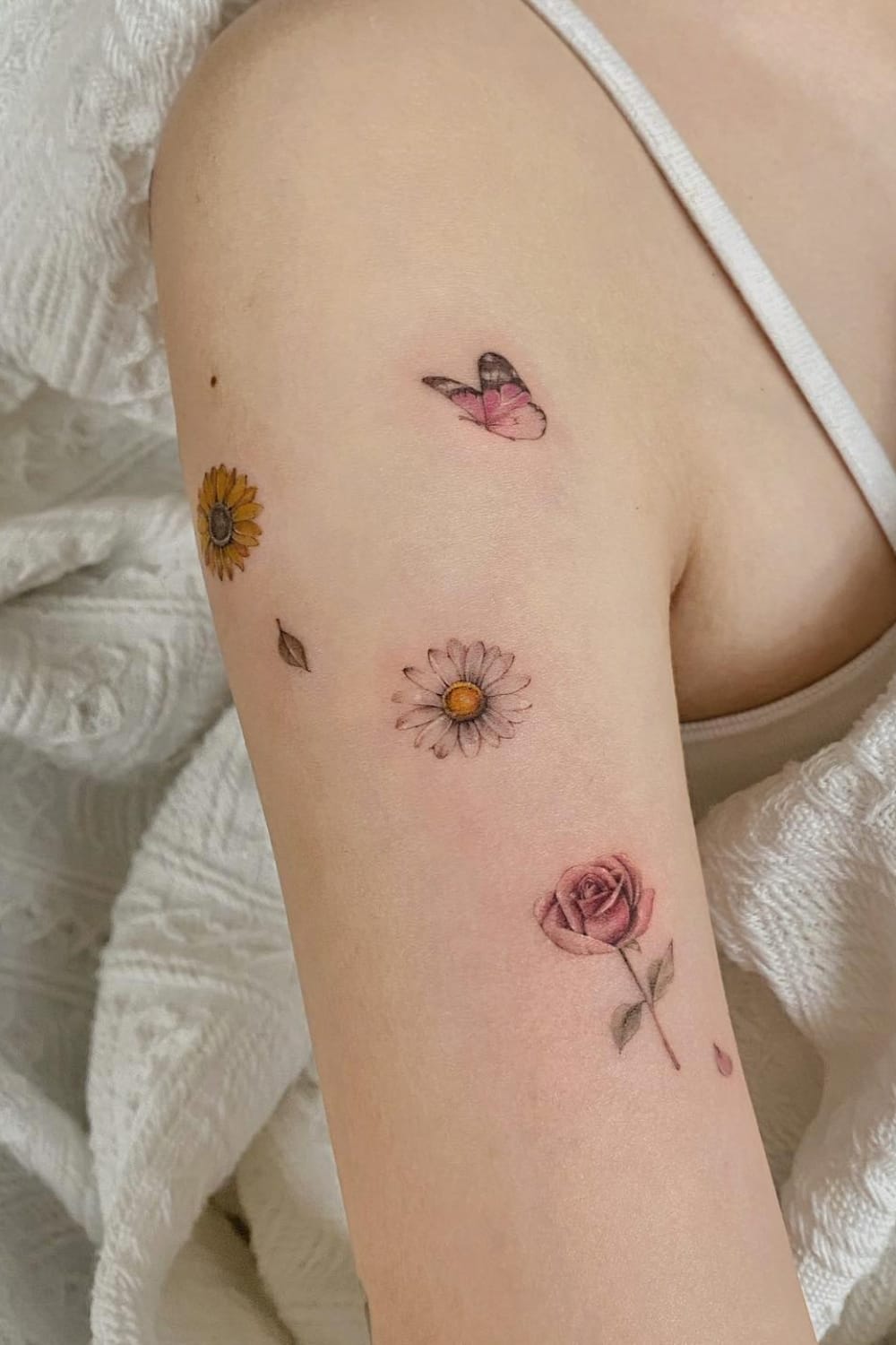 rose and daisy tattoo