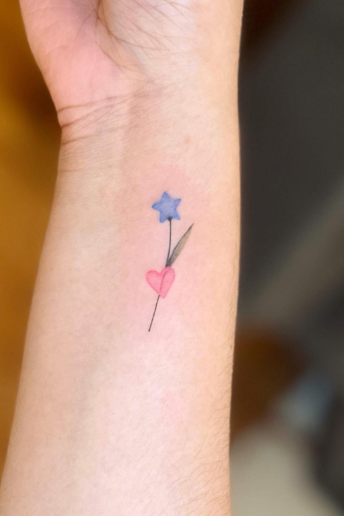 Small Star Flower Tattoo