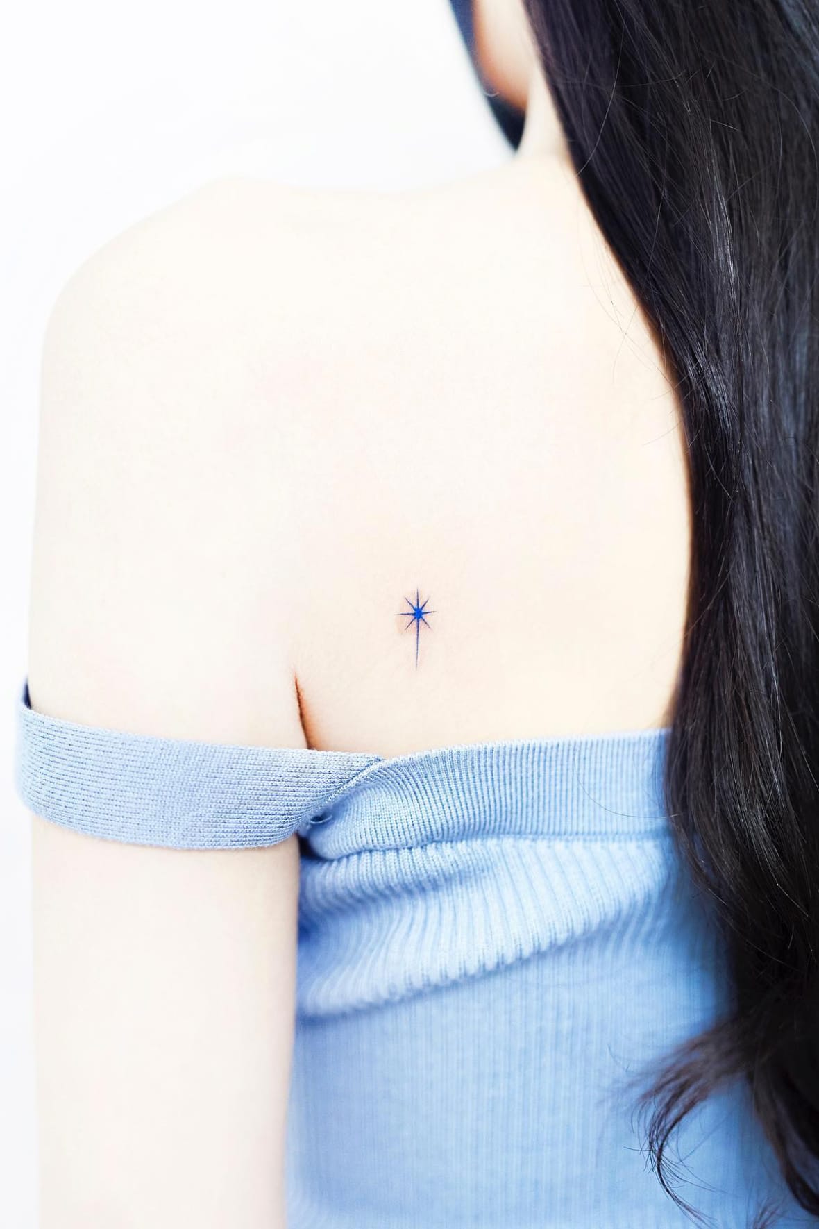 Small Star Tattoo on the Back