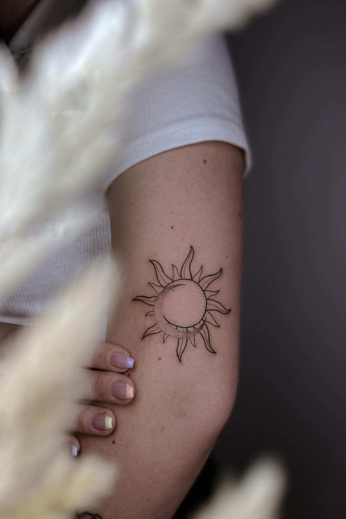 Sun and moon tattoo