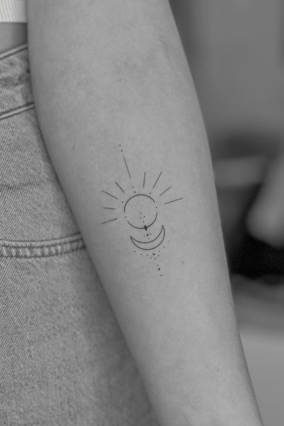 Sun and moon tattoo