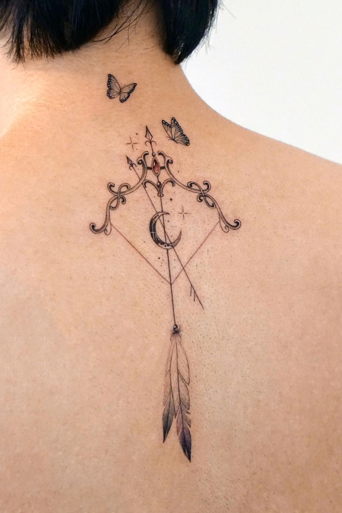 Sagittarius Tattoo On The Back