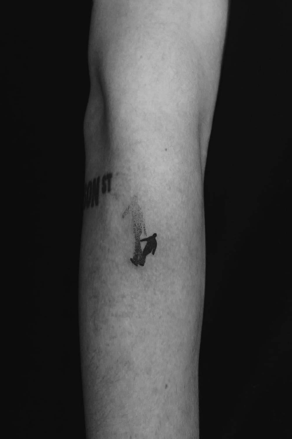 Man and Shadow Silhouette Tattoo