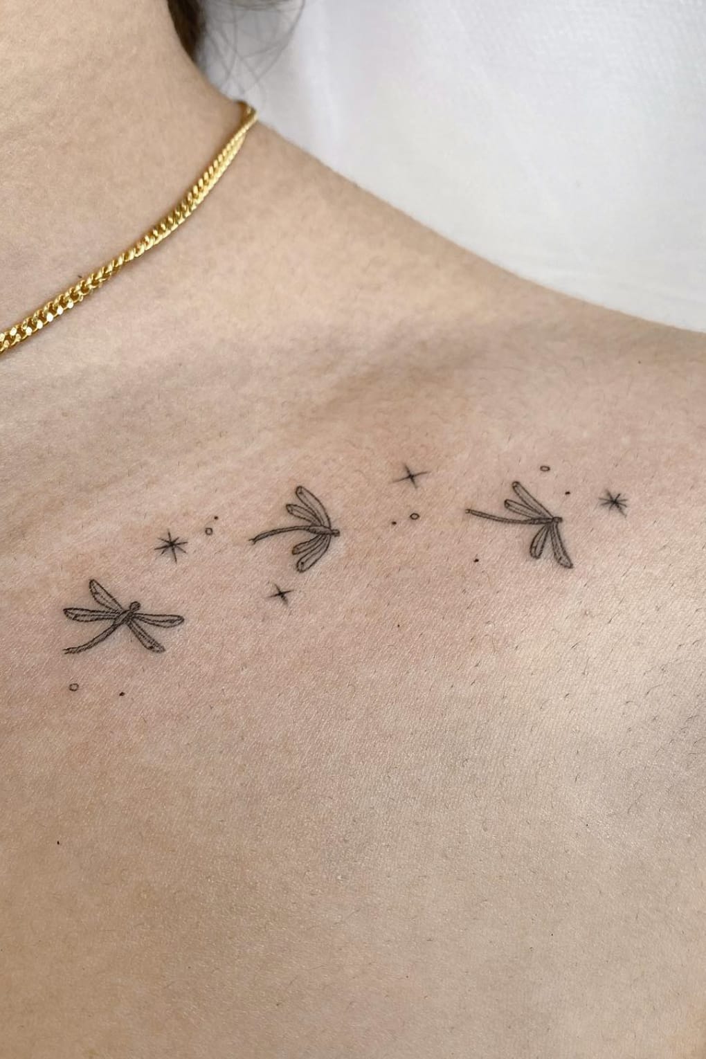 Dragonfly Tattoo On The Collarbone