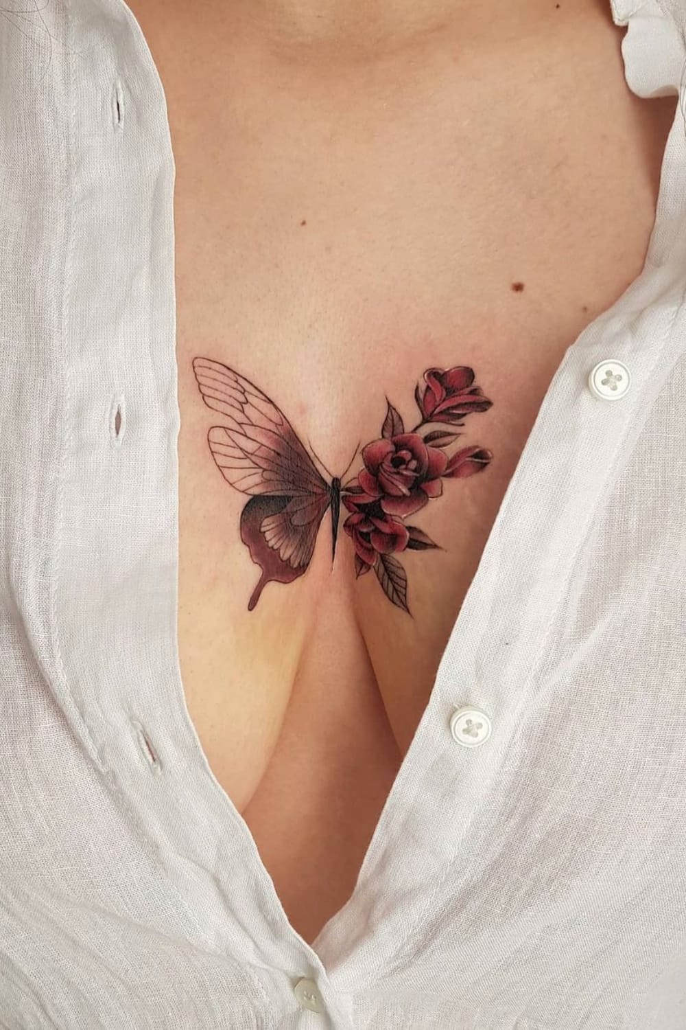 Red Butterfly Tattoo On Chest