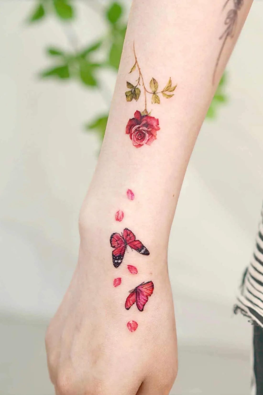 Red Butterfly Tattoo On Hand