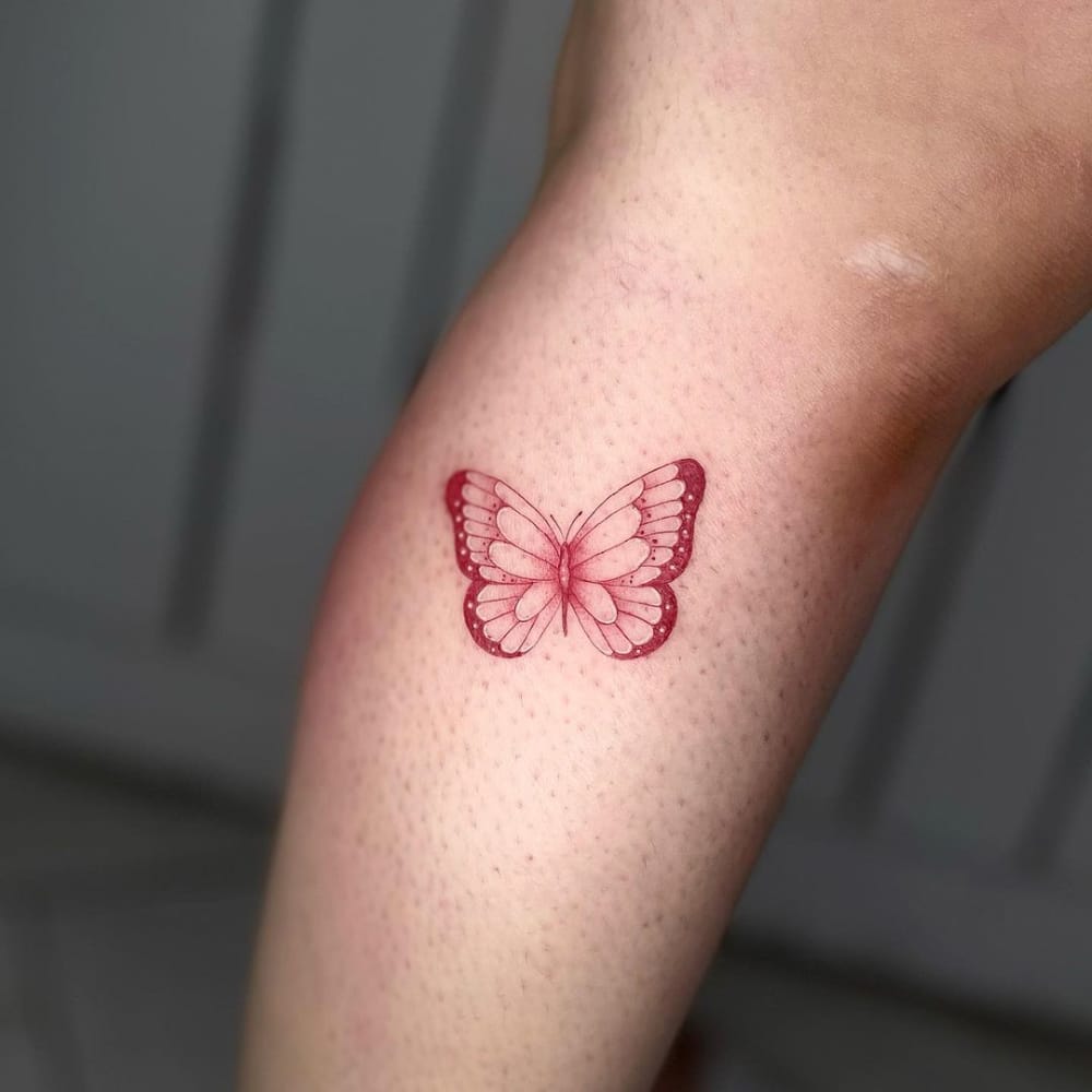 Red Butterfly Tattoo On Leg