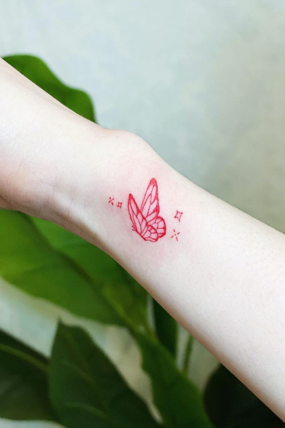 Red Butterfly Tattoo With Stars